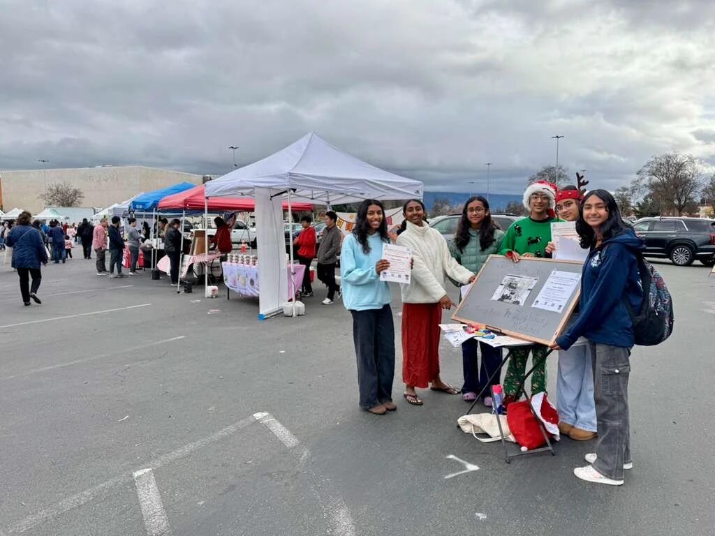 Team at community farmers market